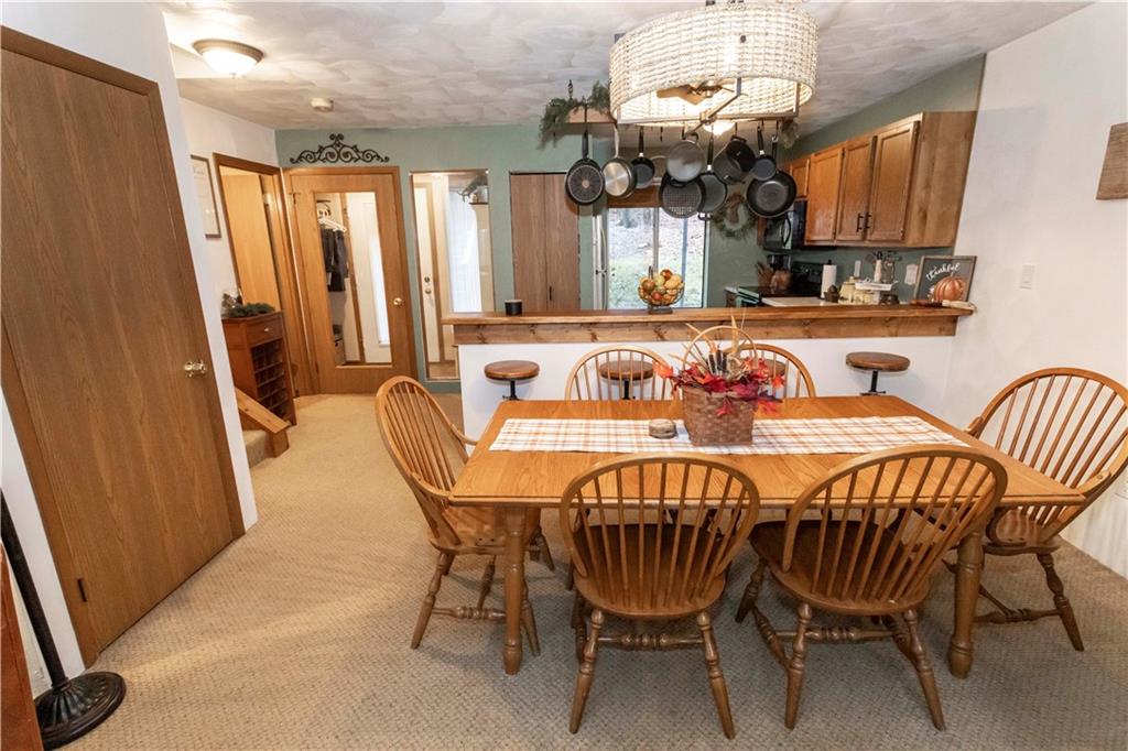 1817 Eagles Ridge Court Hidden Valley, PA 15502 - Photo 14 of 50 a dining room with furniture and window