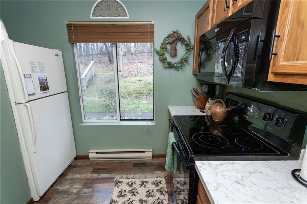 1817 Eagles Ridge Court Hidden Valley, PA 15502 - Photo 18 of 50 a kitchen with a stove and a window