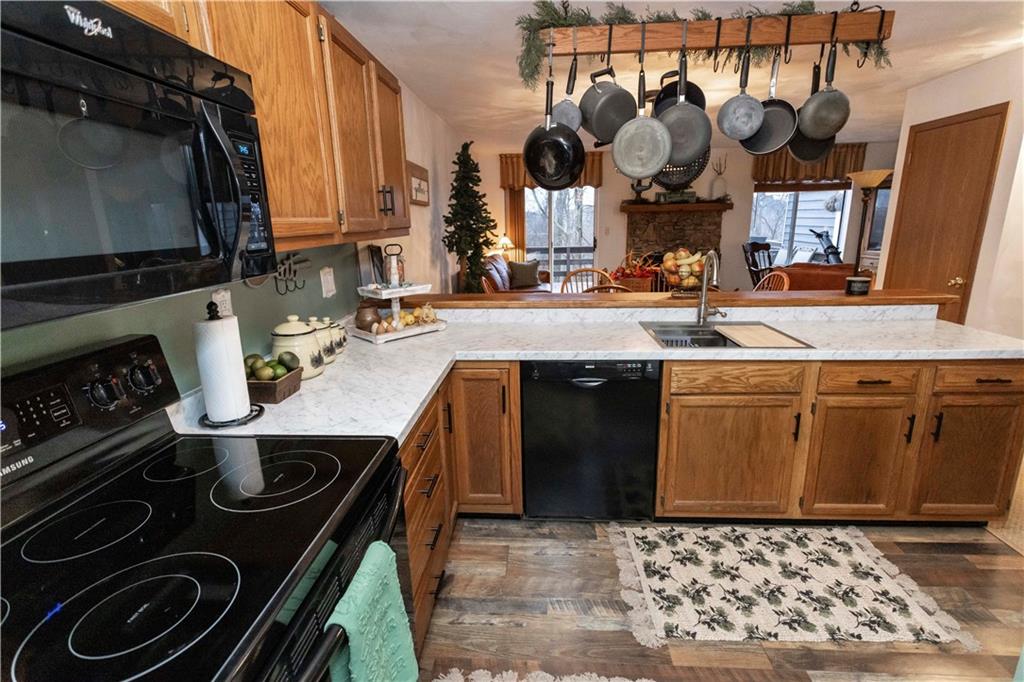 1817 Eagles Ridge Court Hidden Valley, PA 15502 - Photo 19 of 50 a kitchen with stainless steel appliances granite countertop a stove and a sink