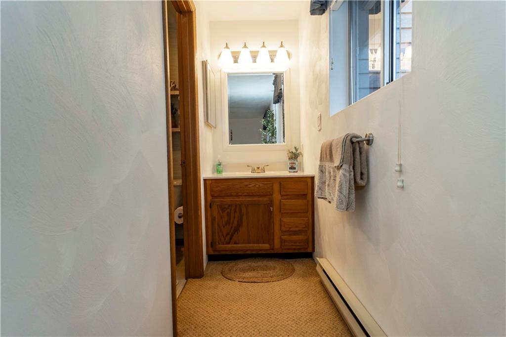 1817 Eagles Ridge Court Hidden Valley, PA 15502 - Photo 26 of 50 a bathroom with a sink and a mirror
