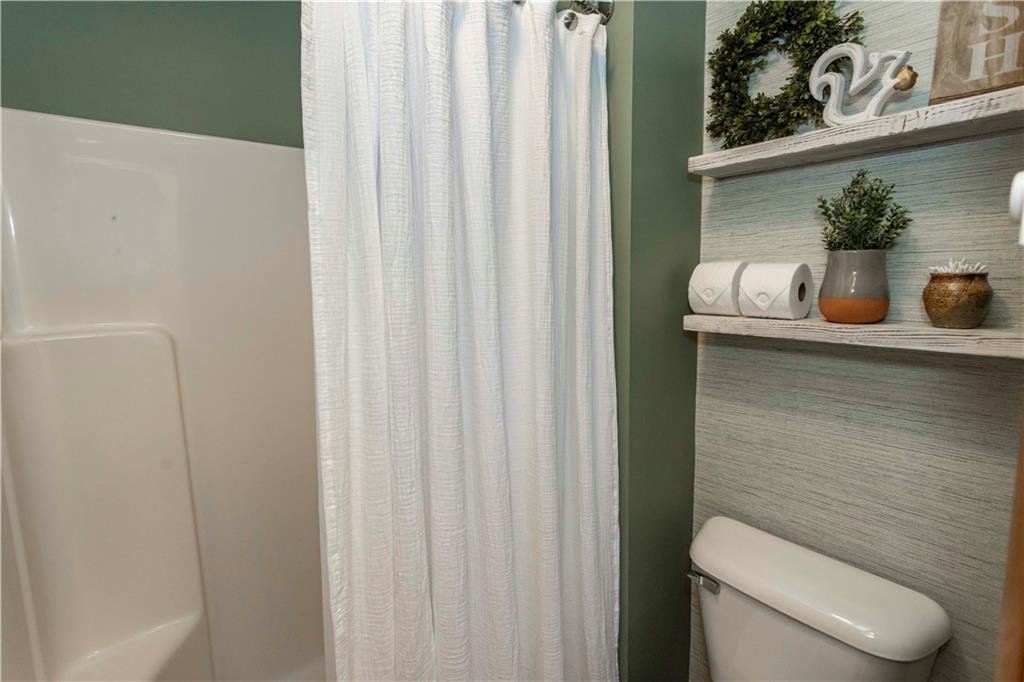1817 Eagles Ridge Court Hidden Valley, PA 15502 - Photo 27 of 50 a bathroom with a toilet and a sink