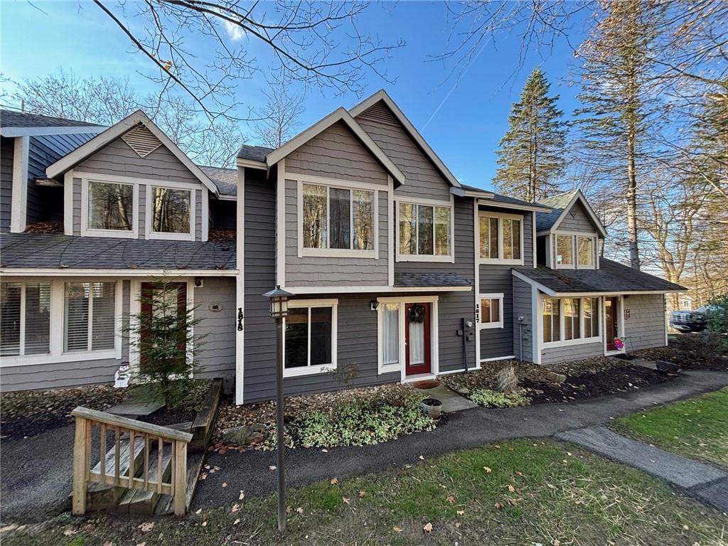 1817 Eagles Ridge Court Hidden Valley, PA 15502 - Photo 34 of 50 a front view of a house with garden