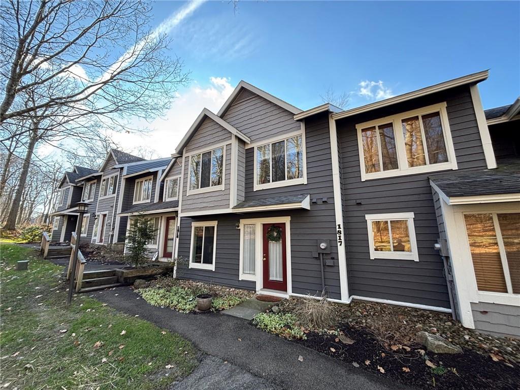 1817 Eagles Ridge Court Hidden Valley, PA 15502 - Photo 36 of 50 a front view of a house with garden