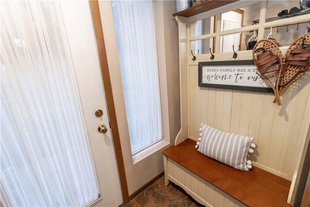 1817 Eagles Ridge Court Hidden Valley, PA 15502 - Photo 5 of 50 a view of a door and bench in a room