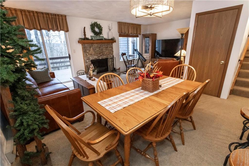 1817 Eagles Ridge Court Hidden Valley, PA 15502 - Photo 8 of 50 a view of a dining room with furniture window and wooden floor