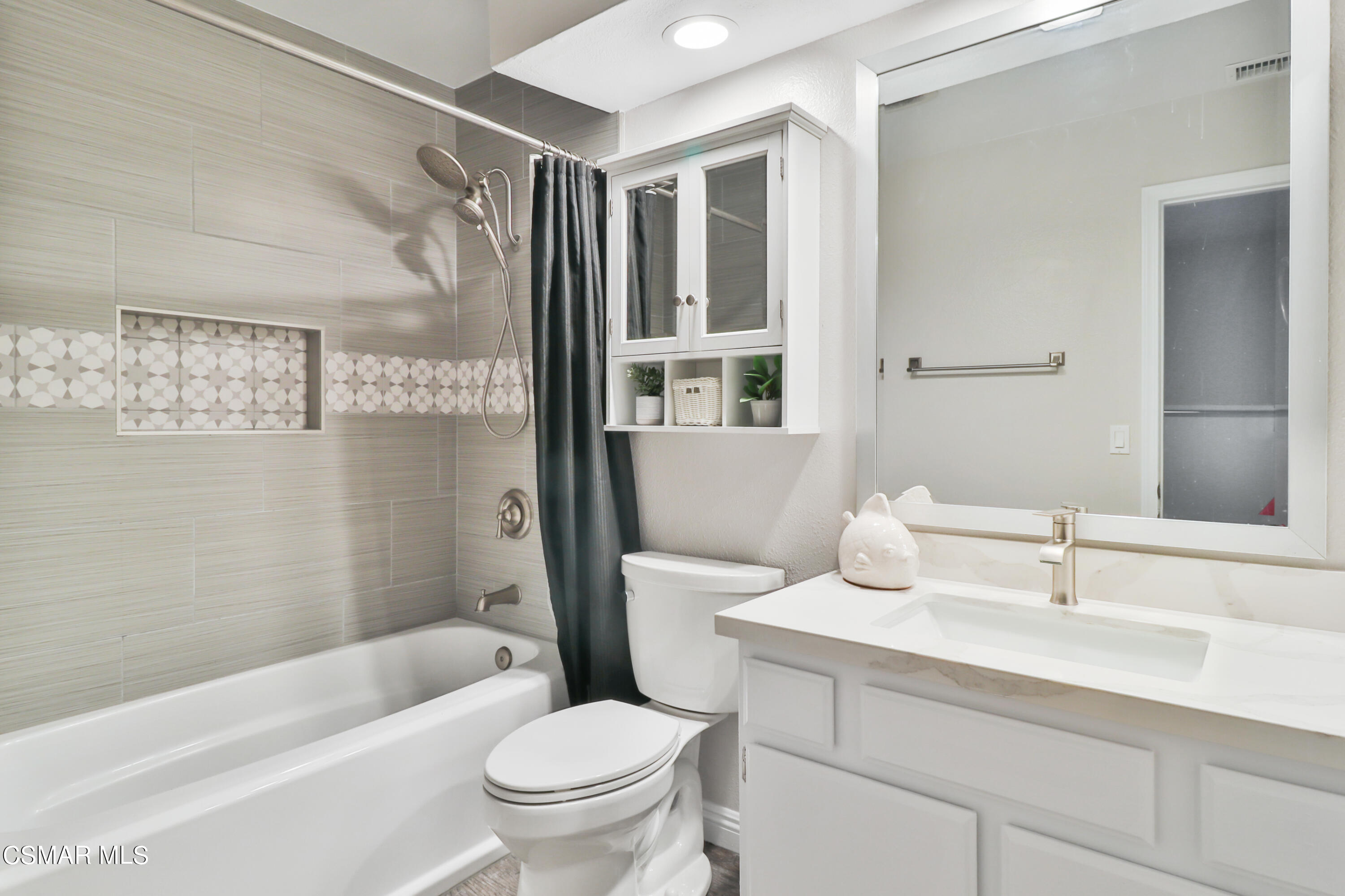 3974 Cochran Street, Unit 80 Simi Valley, CA 93063 - Photo 25 of 33 a bathroom with a sink toilet and shower