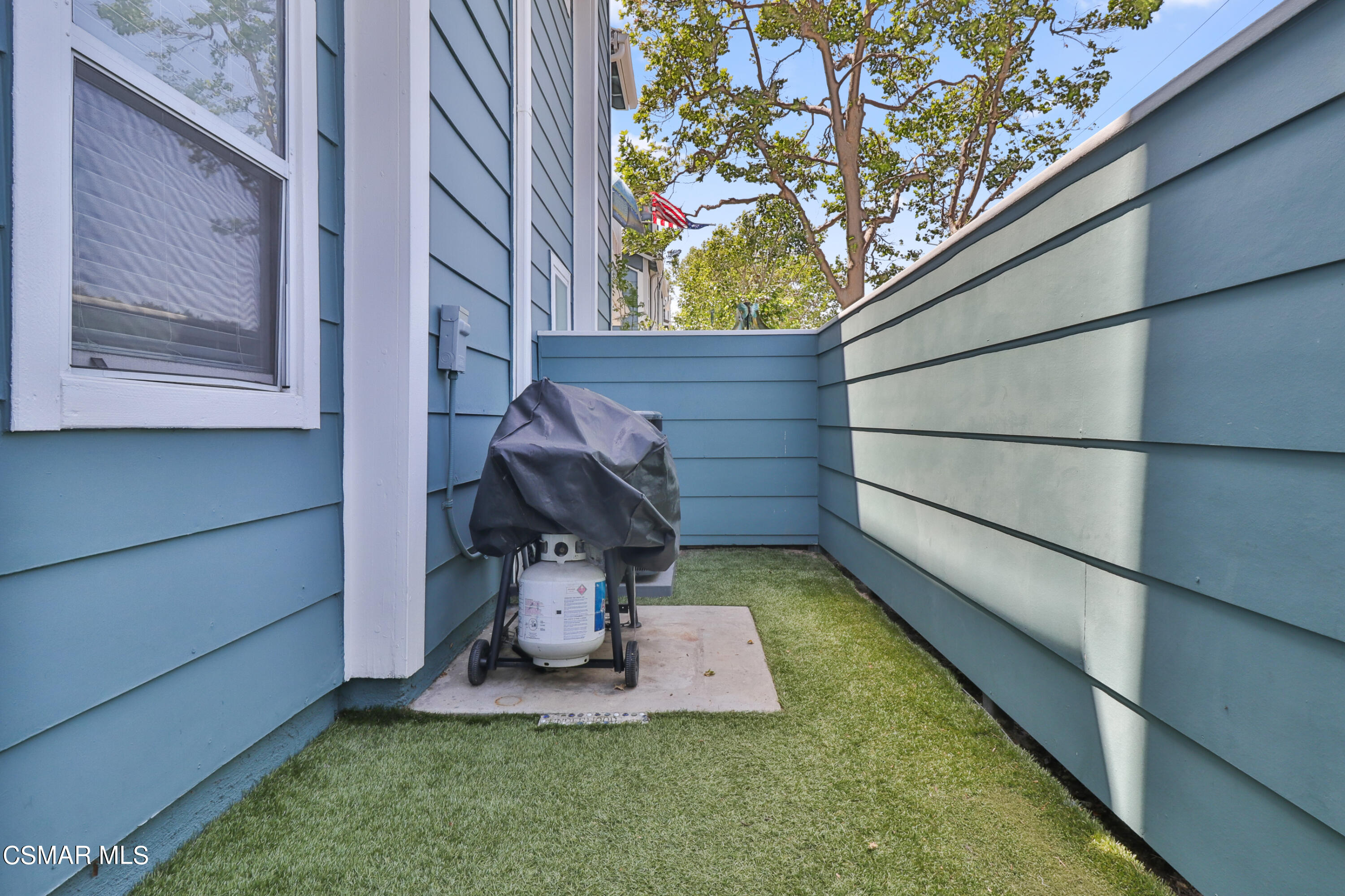 3974 Cochran Street, Unit 80 Simi Valley, CA 93063 - Photo 3 of 33 a view of backyard with tub and outdoor seating