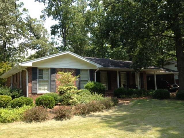 13 Castlewood Drive Southwest Rome, GA 30165 - Photo 1 of 1 a front view of a house with garden