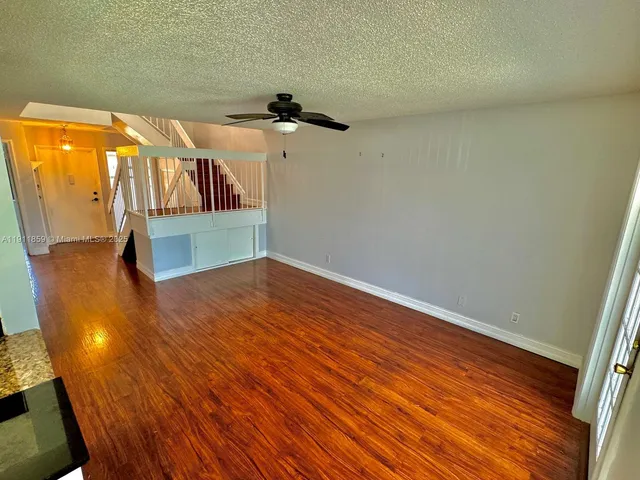 a hallway with wooden floor