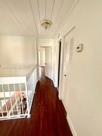 a view of entryway with wooden floor