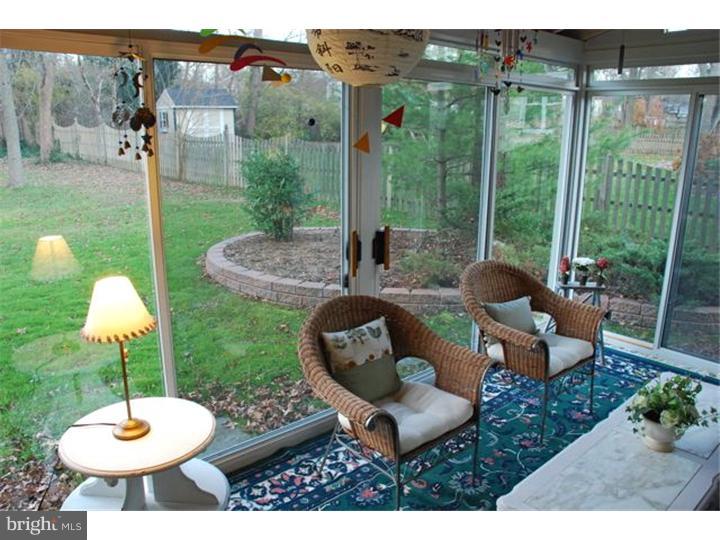 559 Tarrington Road Cherry Hill, NJ 08034 - Photo 11 of 25 a view of a table and chairs in the patio