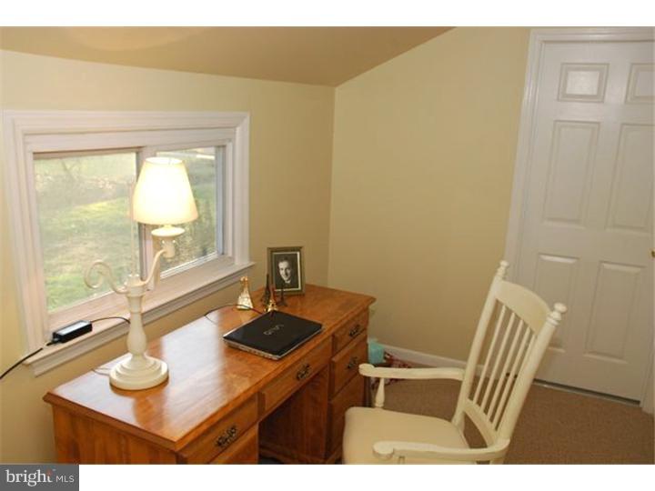 559 Tarrington Road Cherry Hill, NJ 08034 - Photo 16 of 25 a kitchen with a sink a window and a table