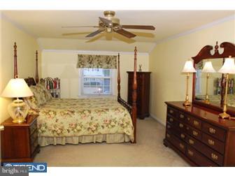 559 Tarrington Road Cherry Hill, NJ 08034 - Photo 17 of 25 a bedroom with a bed mirror and window