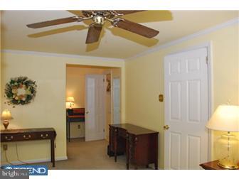 559 Tarrington Road Cherry Hill, NJ 08034 - Photo 18 of 25 a bedroom with a bed and a dresser