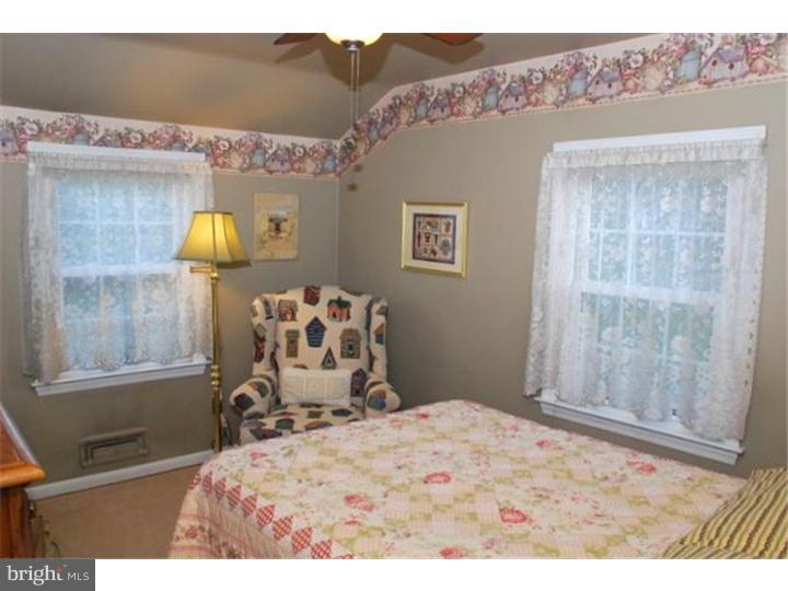 559 Tarrington Road Cherry Hill, NJ 08034 - Photo 20 of 25 a bedroom with a bed and dresser