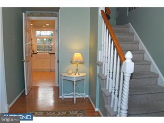 559 Tarrington Road Cherry Hill, NJ 08034 - Photo 4 of 25 a view of entryway and hall with wooden floor