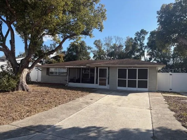 a house with trees in the background
