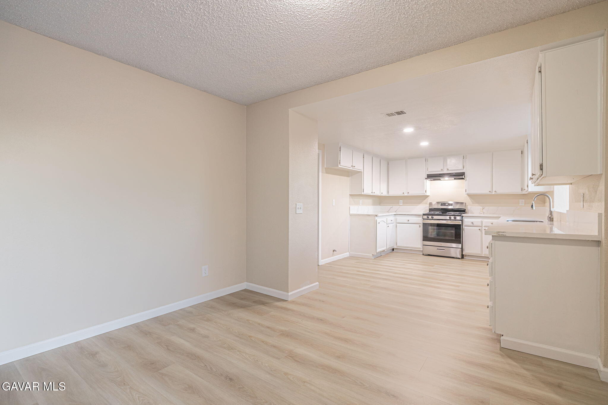 1201 Camran Avenue Lancaster, CA 93535 - Photo 33 of 49 a view of kitchen with wooden floor