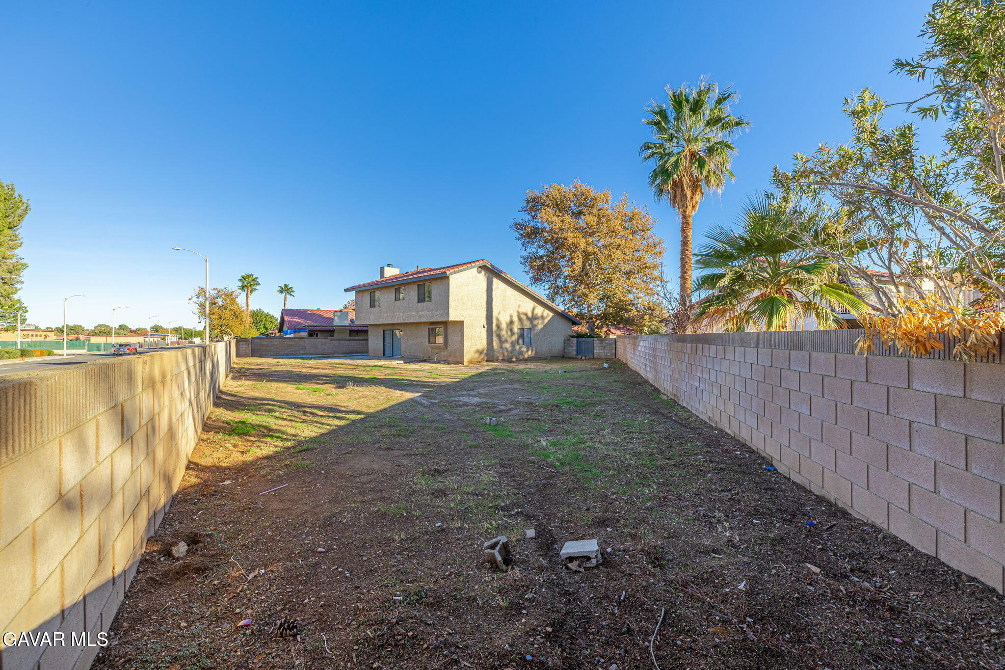 1201 Camran Avenue Lancaster, CA 93535 - Photo 45 of 49 a view of a house with a swimming pool
