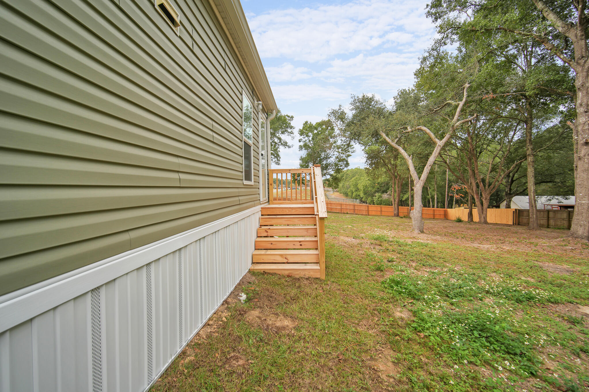 2303 Lewis Street Crestview, FL 32536 - Photo 26 of 32 a view of outdoor space with garden