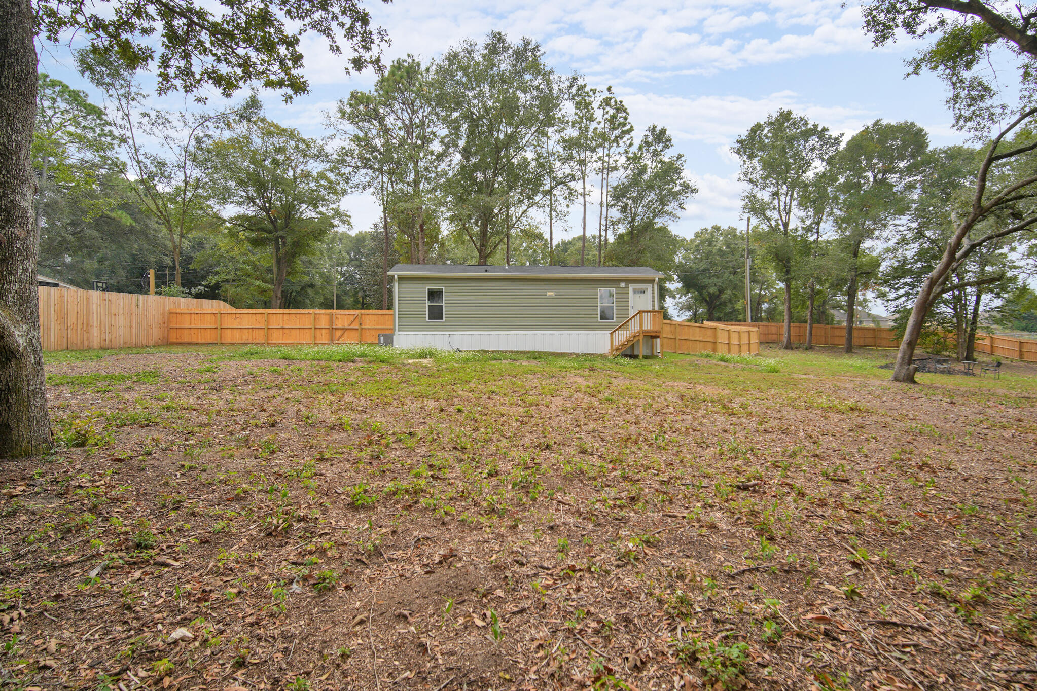2303 Lewis Street Crestview, FL 32536 - Photo 27 of 32 a view of a backyard