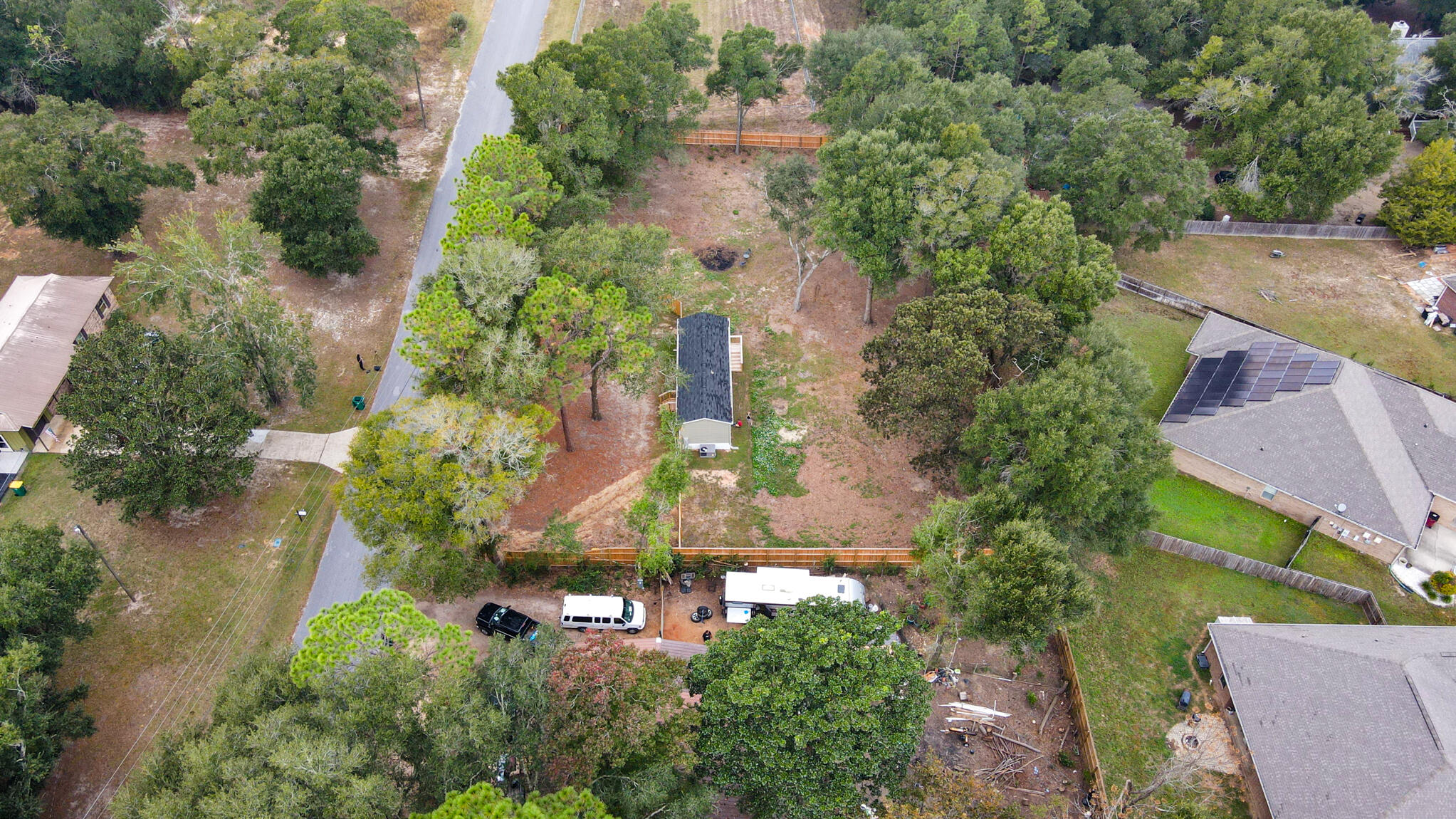 2303 Lewis Street Crestview, FL 32536 - Photo 29 of 32 an aerial view of a house with a yard