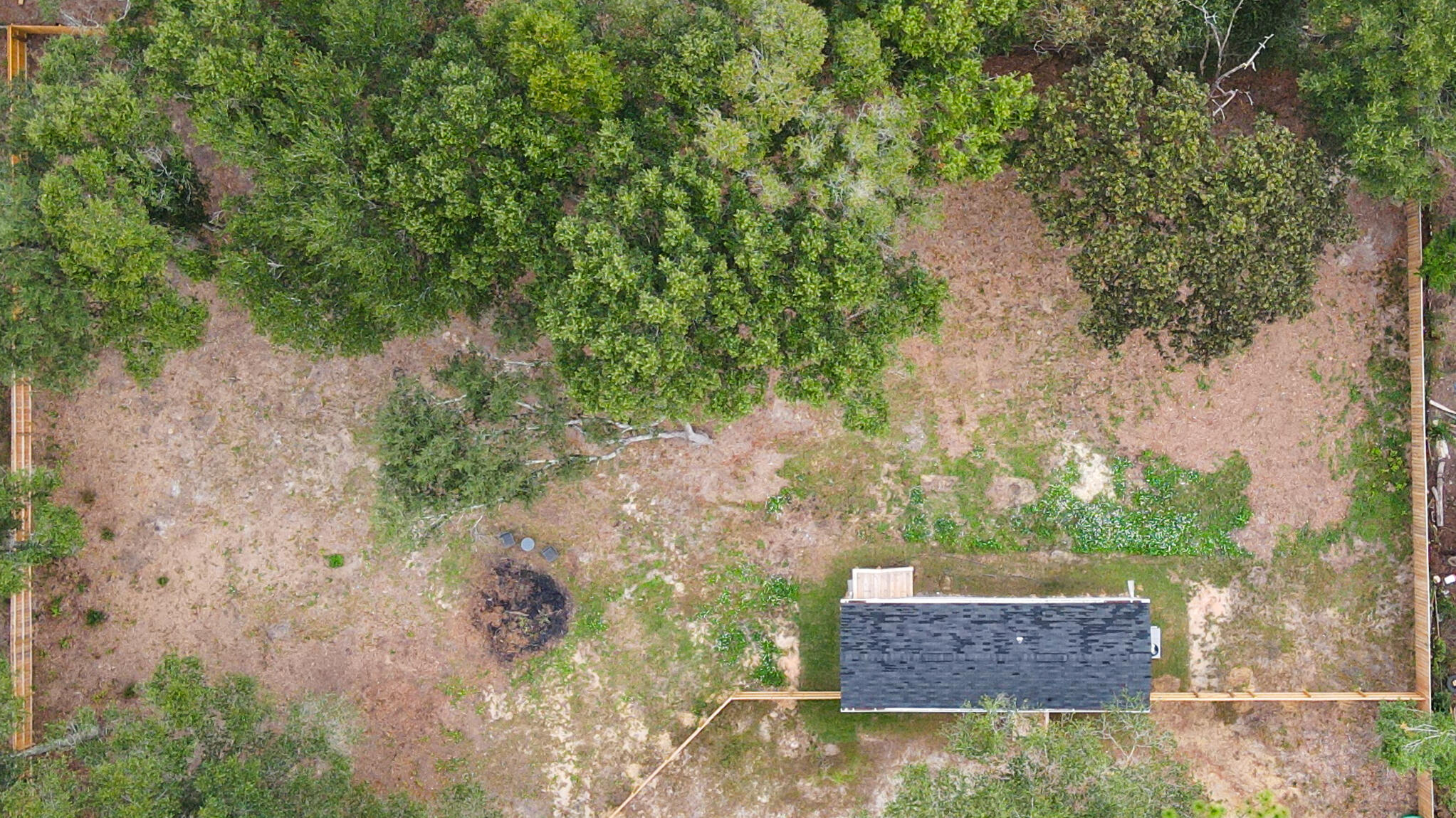 2303 Lewis Street Crestview, FL 32536 - Photo 32 of 32 an aerial view of a house with a yard