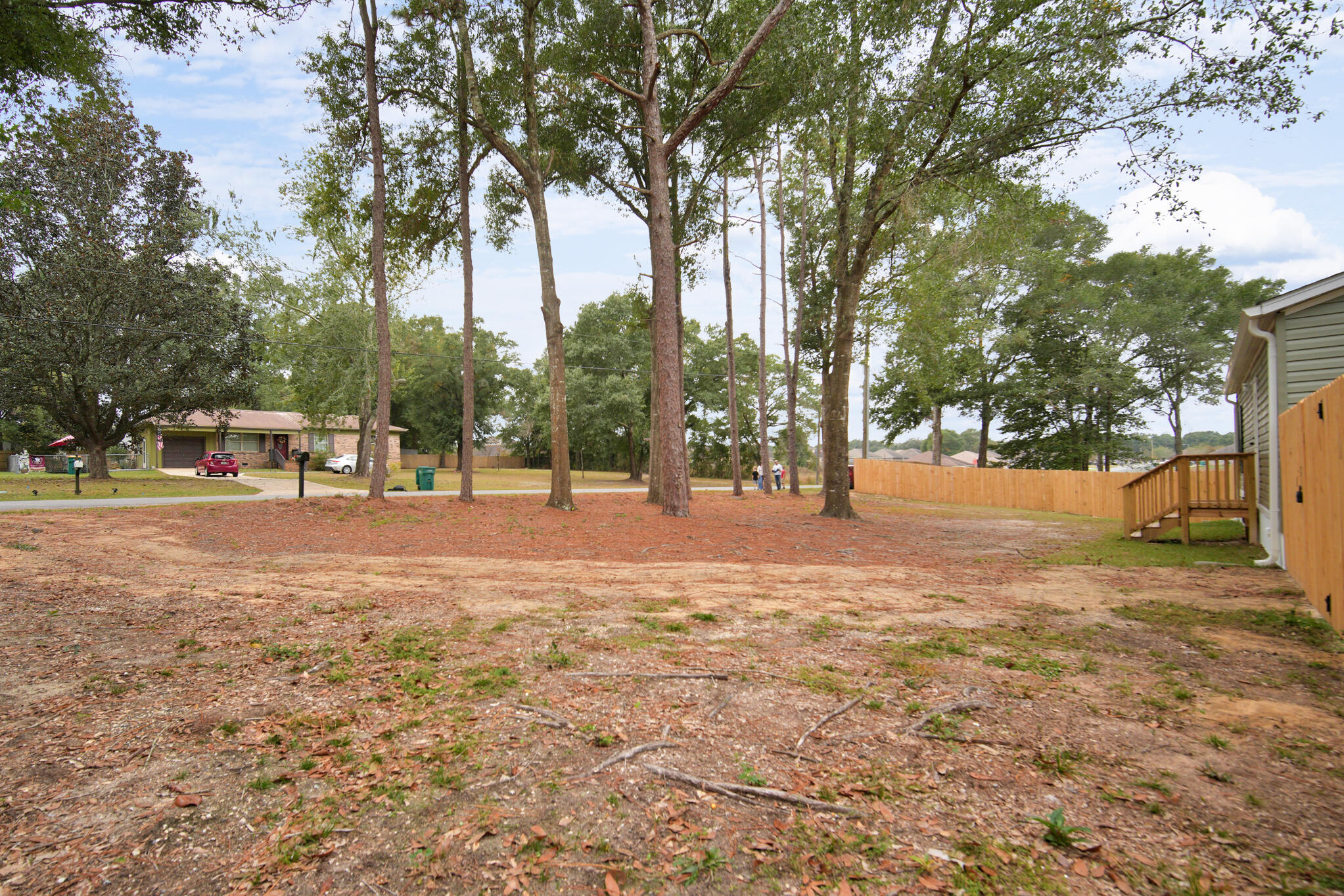 2303 Lewis Street Crestview, FL 32536 - Photo 5 of 32 a view of road with trees