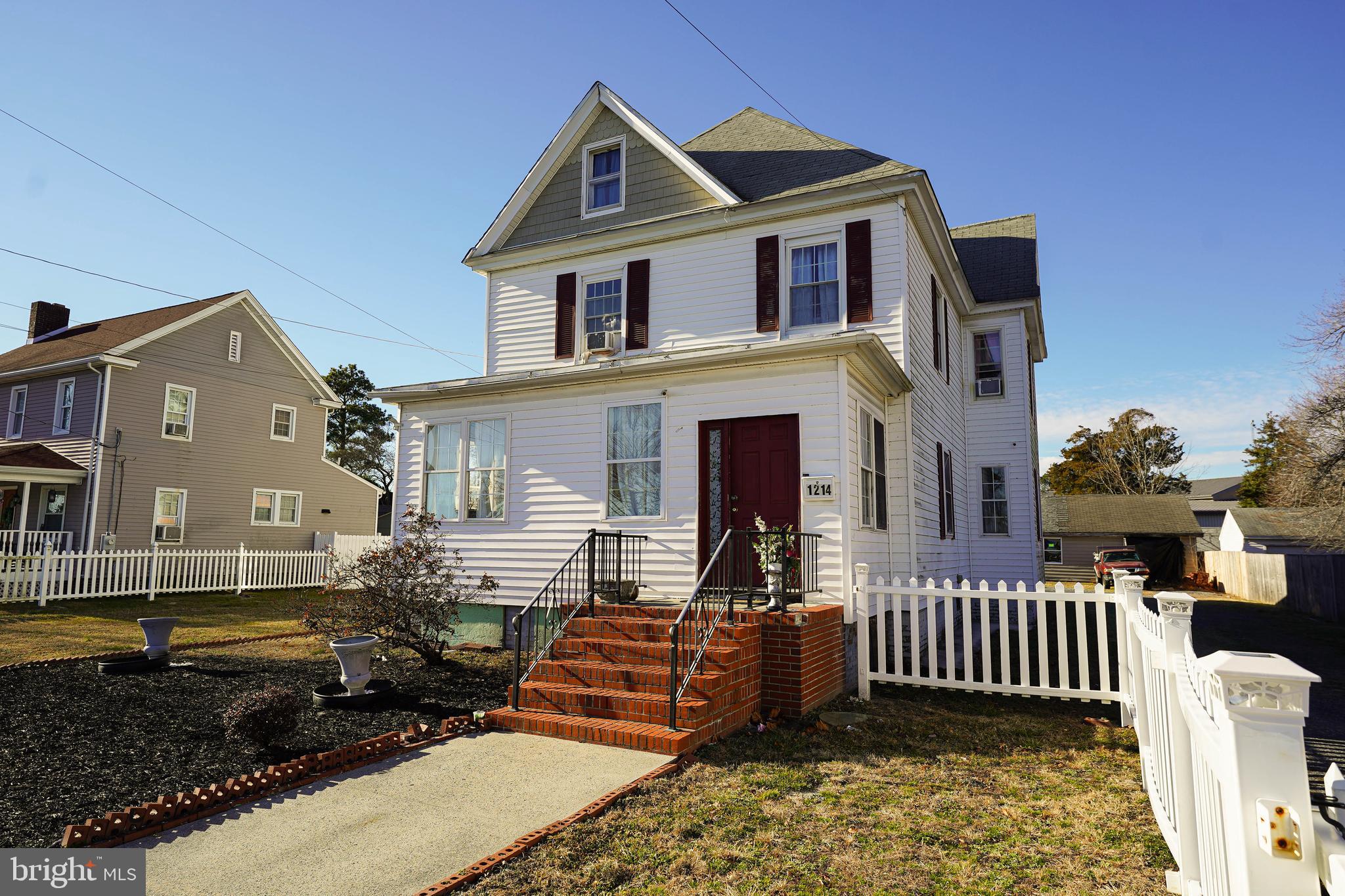 a front view of a house with a porch