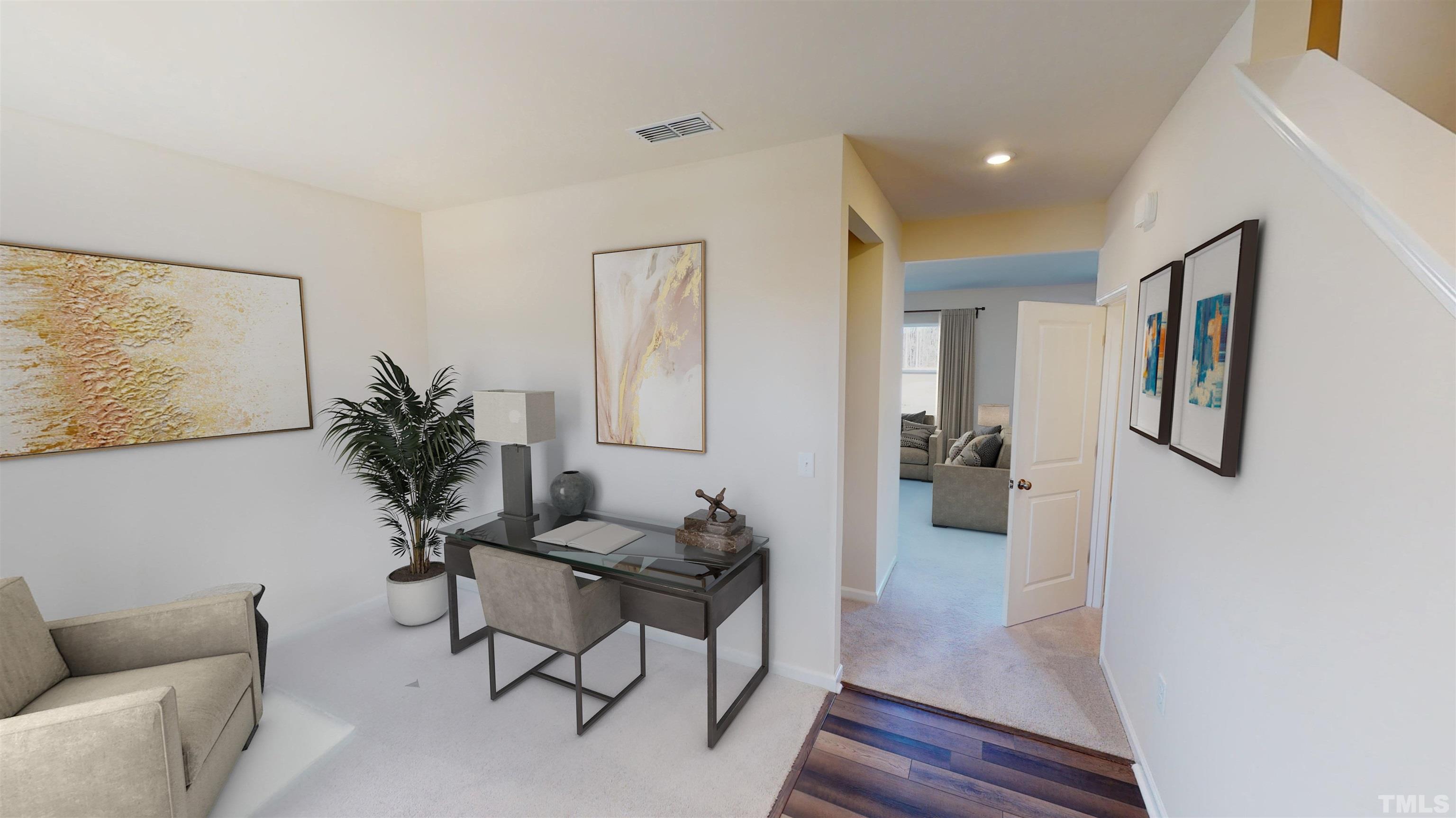 1508 Justice Union Court Raleigh, NC 27604 - Photo 4 of 25 a living room with furniture and a potted plant