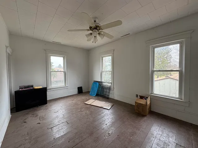 a view of an empty room with a window