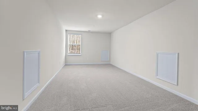 a bathroom with a sink toilet vanity and shower