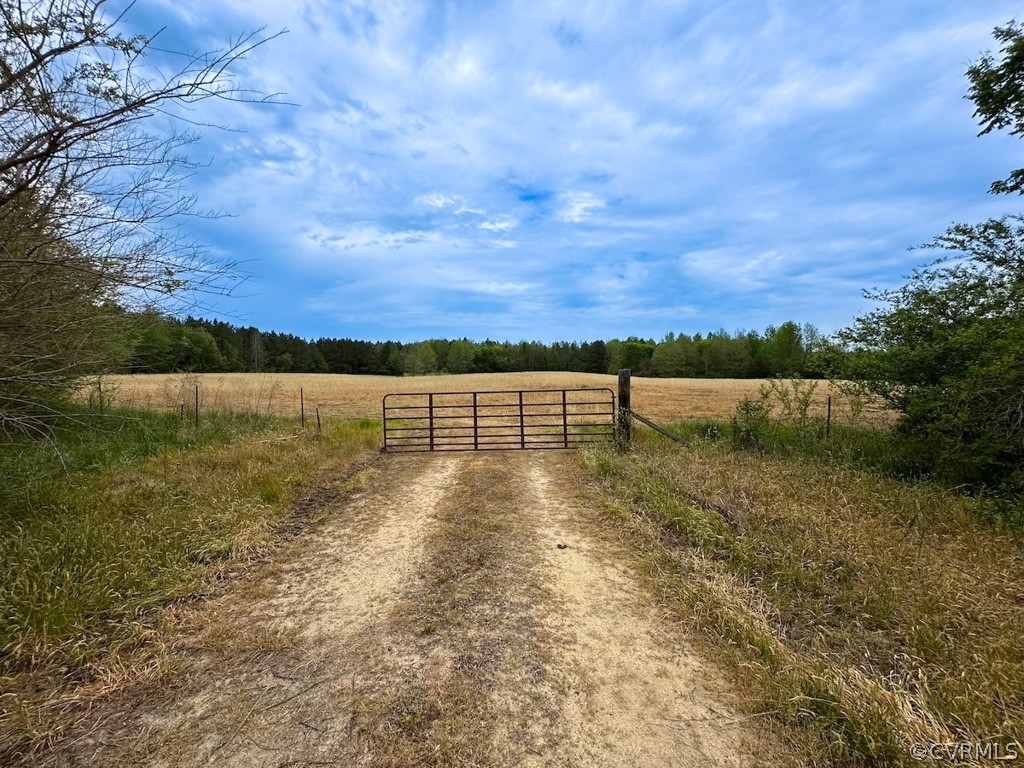 81-acres Lebanon Church Road Jarratt, VA 23867 - Photo 4 of 36 a view of lake with sunset in background