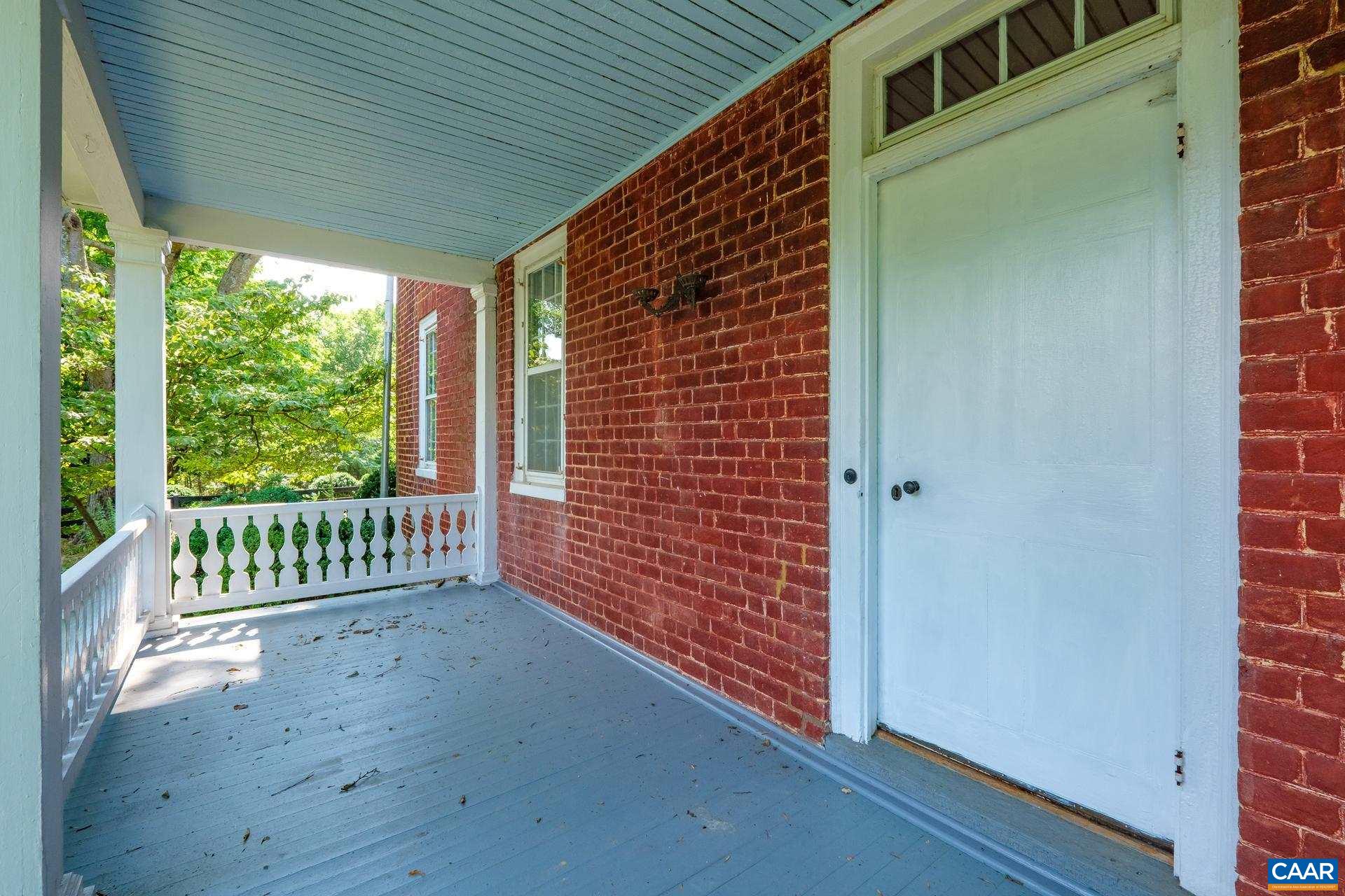 464 Long Meadow Road Fishersville, VA 22939 - Photo 54 of 62 a view of a porch with wooden floor and a yard