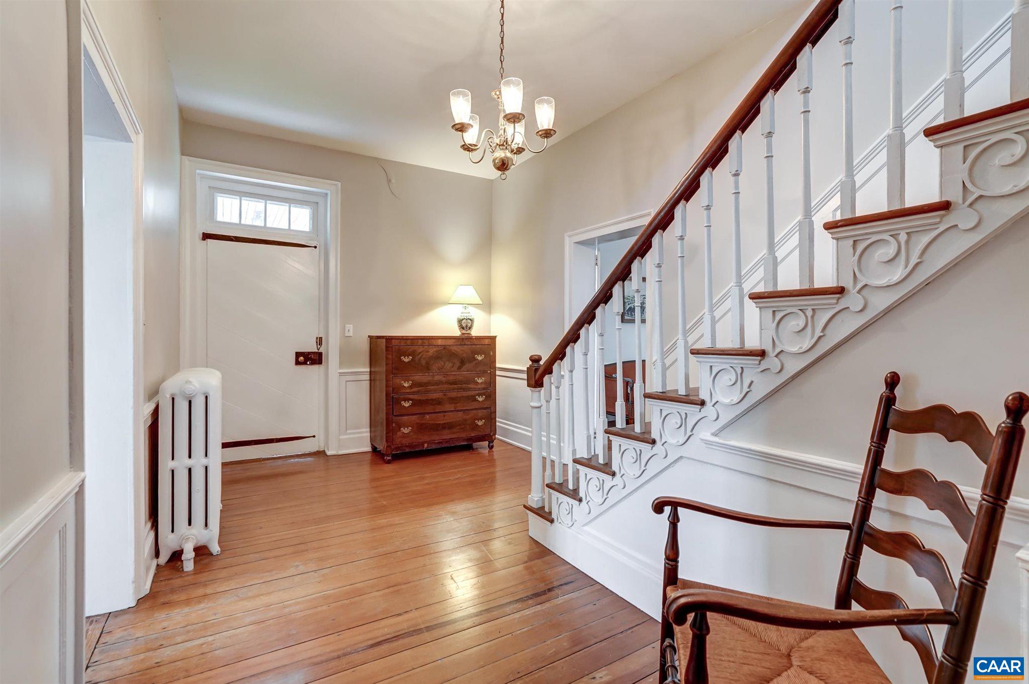 464 Long Meadow Road Fishersville, VA 22939 - Photo 8 of 62 a view of entryway with wooden floor and stairs