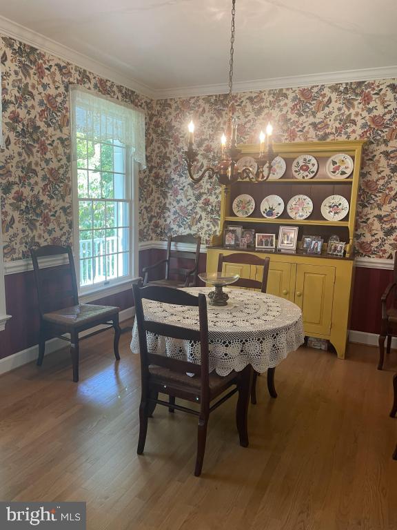 5597 Sedwick Court Frederick, MD 21702 - Photo 31 of 66 a view of a dining room with furniture window and outside view