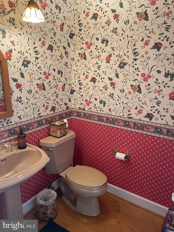 5597 Sedwick Court Frederick, MD 21702 - Photo 33 of 66 a bathroom with a toilet and a sink