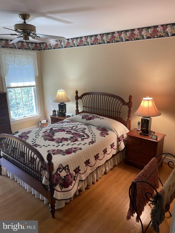 5597 Sedwick Court Frederick, MD 21702 - Photo 34 of 66 a bedroom with a bed and a window
