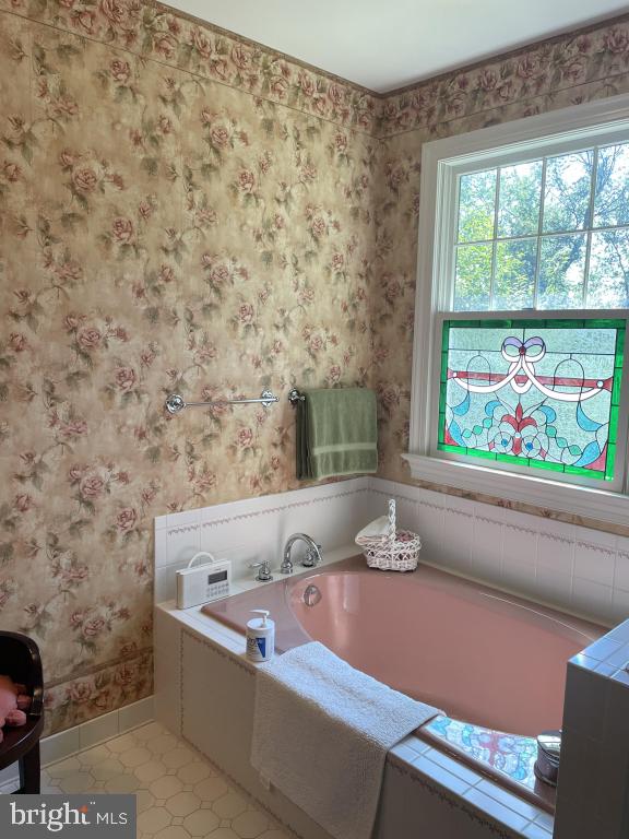 5597 Sedwick Court Frederick, MD 21702 - Photo 40 of 66 a view of a bathtub in a bathroom