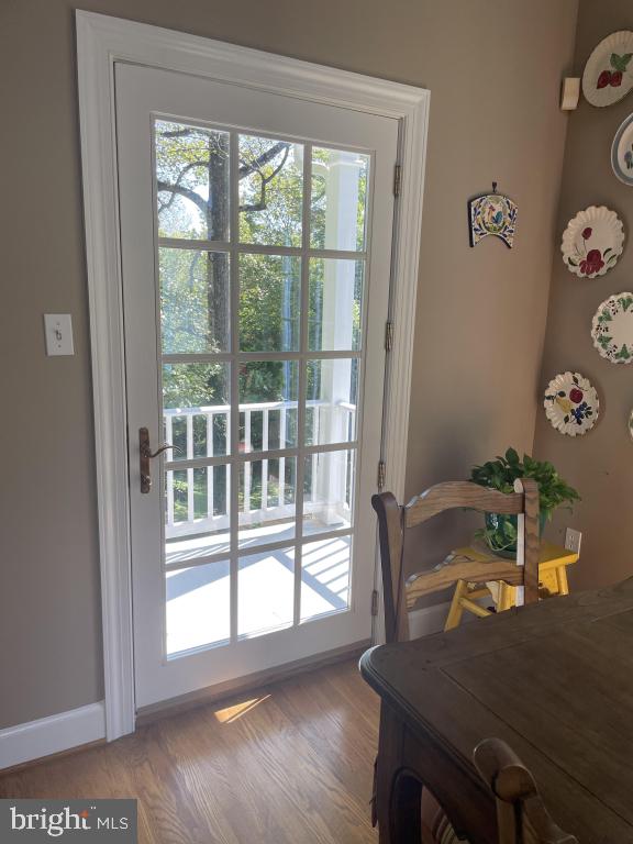 5597 Sedwick Court Frederick, MD 21702 - Photo 61 of 66 a workspace with furniture and wooden floor