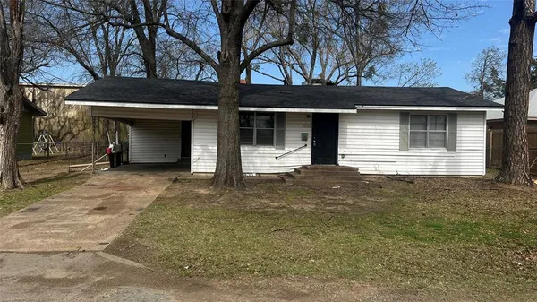 a front view of a house with a garage