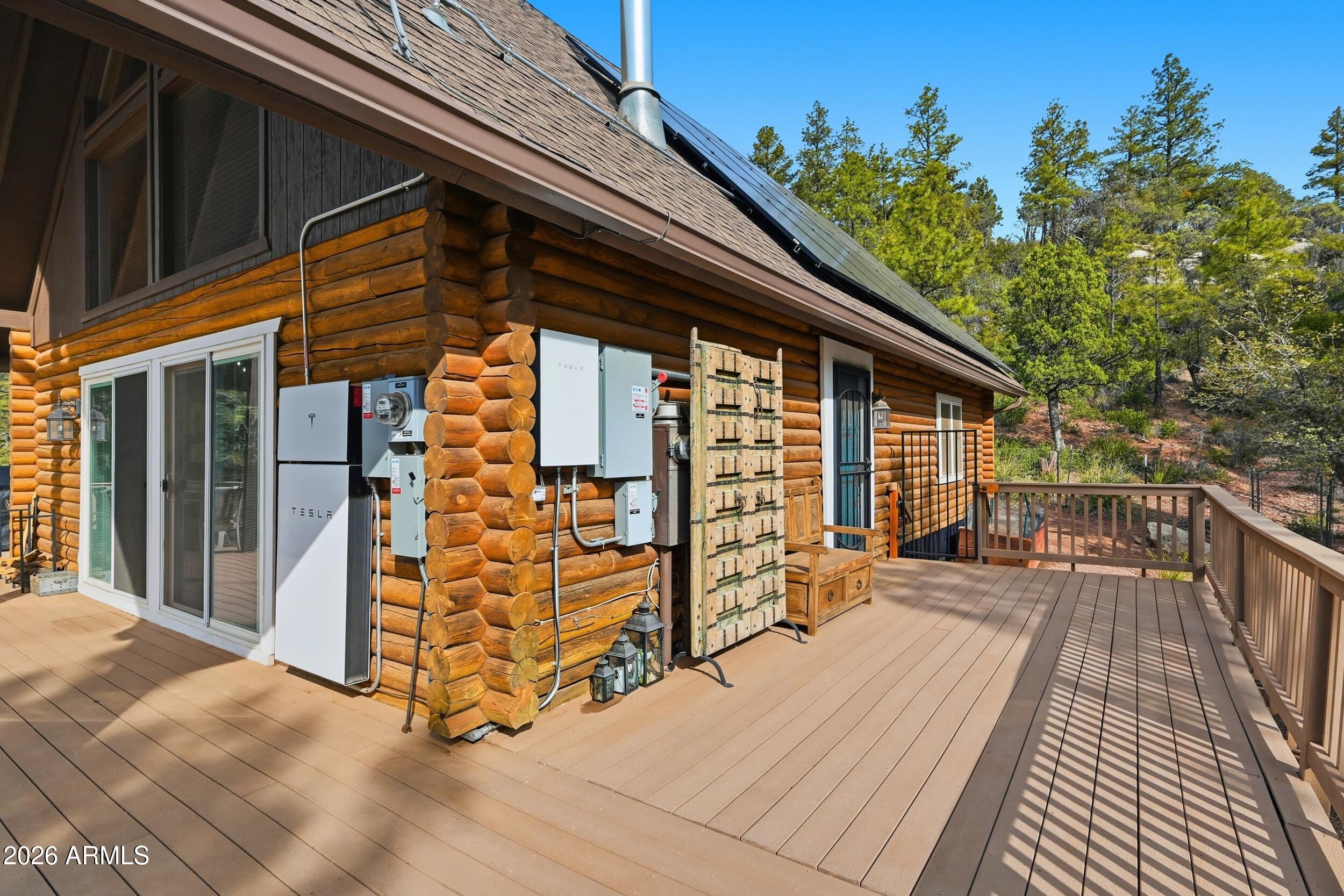 228 East Belluzzi Boulevard Payson, AZ 85541 - Photo 11 of 53 a view of a balcony with wooden floor and seating space