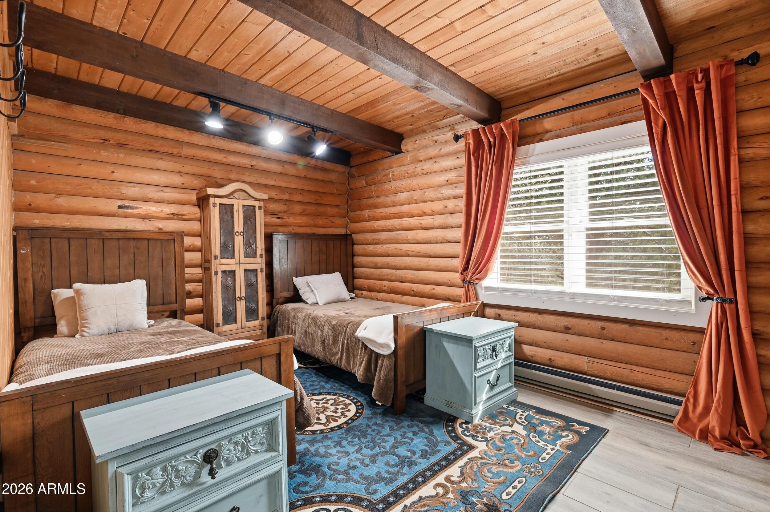 228 East Belluzzi Boulevard Payson, AZ 85541 - Photo 22 of 53 a bedroom with furniture and a window