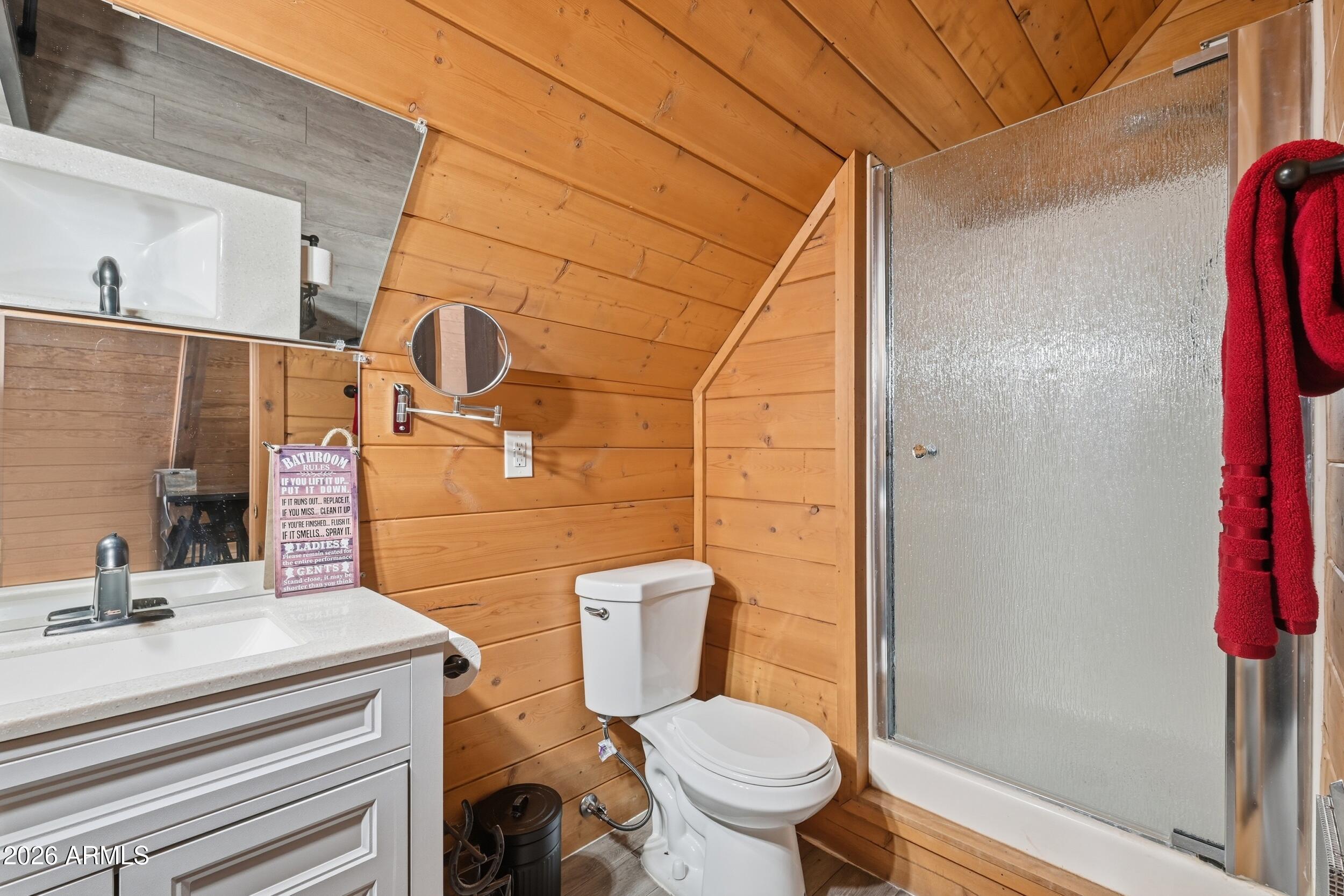 228 East Belluzzi Boulevard Payson, AZ 85541 - Photo 30 of 53 a bathroom with a sink toilet vanity and shower