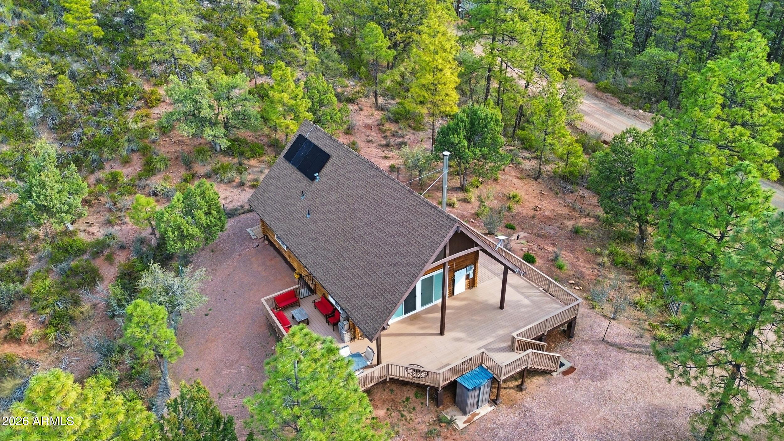 228 East Belluzzi Boulevard Payson, AZ 85541 - Photo 36 of 53 an aerial view of a house with large trees