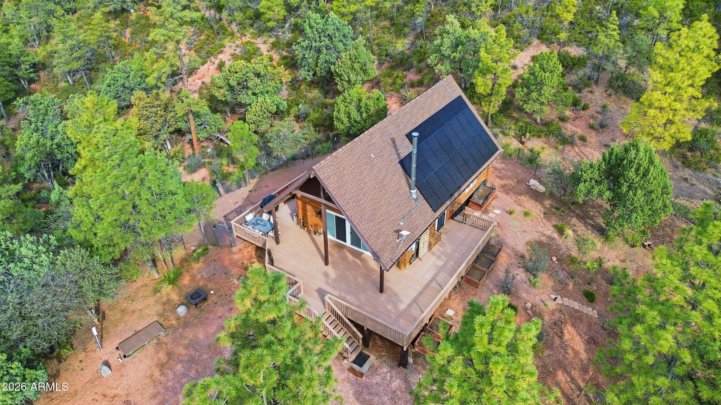 228 East Belluzzi Boulevard Payson, AZ 85541 - Photo 38 of 53 an aerial view of house with yard and trees in the background