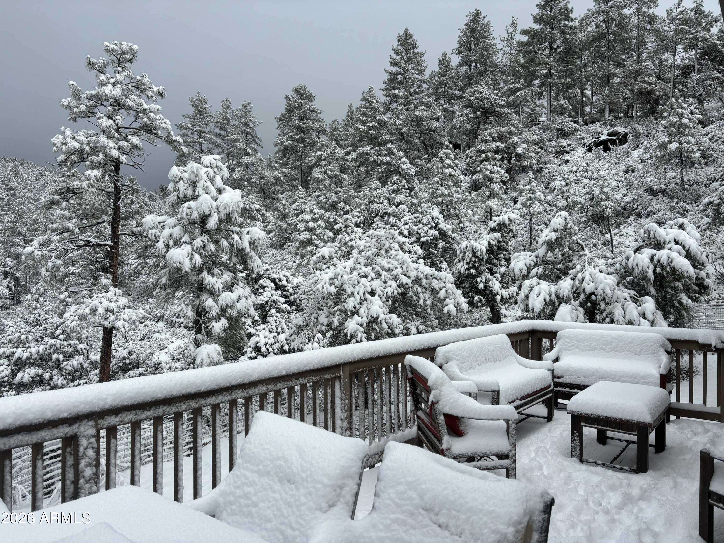 228 East Belluzzi Boulevard Payson, AZ 85541 - Photo 45 of 53 a balcony with table and chairs