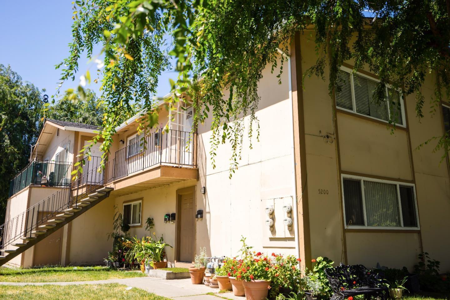 5200 Snow Drive San Jose, CA 95111 - Photo 2 of 2 a view of a building with a tree