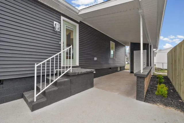 a view of a house with a street