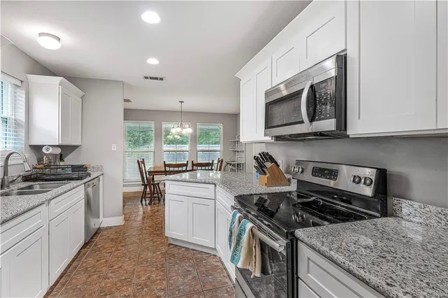 $220,000 | 23597 South Point Drive, Denham Springs, LA 70726